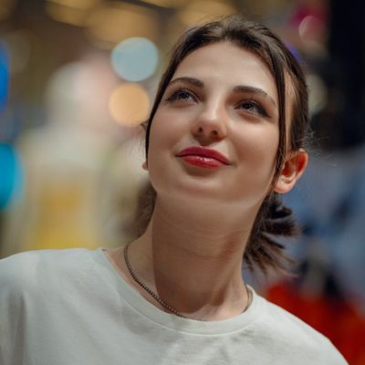 Portrait of a smiling confident woman named Zofia.